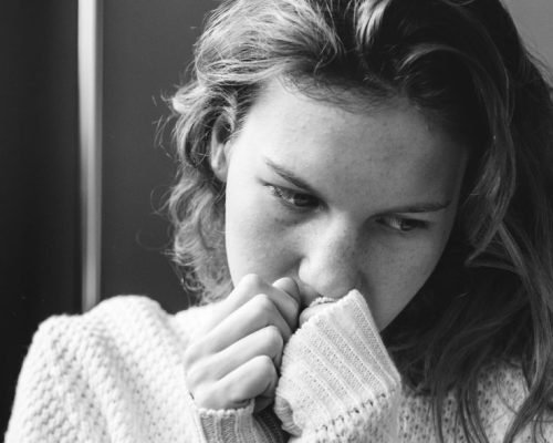 Sad girl in her loneliness